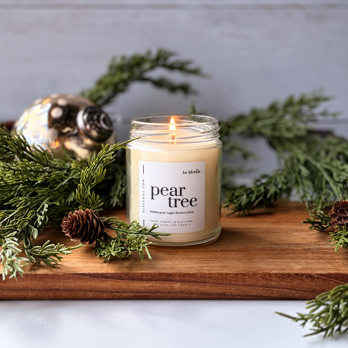 Pear Tree soy candle by Be Blends, scented with Bartlett pear, sugar plum, and vanilla.
