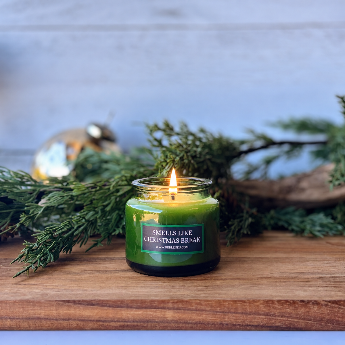 Smells Like Christmas Break 3 oz soy candle in a green jar with fresh Fraser Fir fragrance by Be Blends.