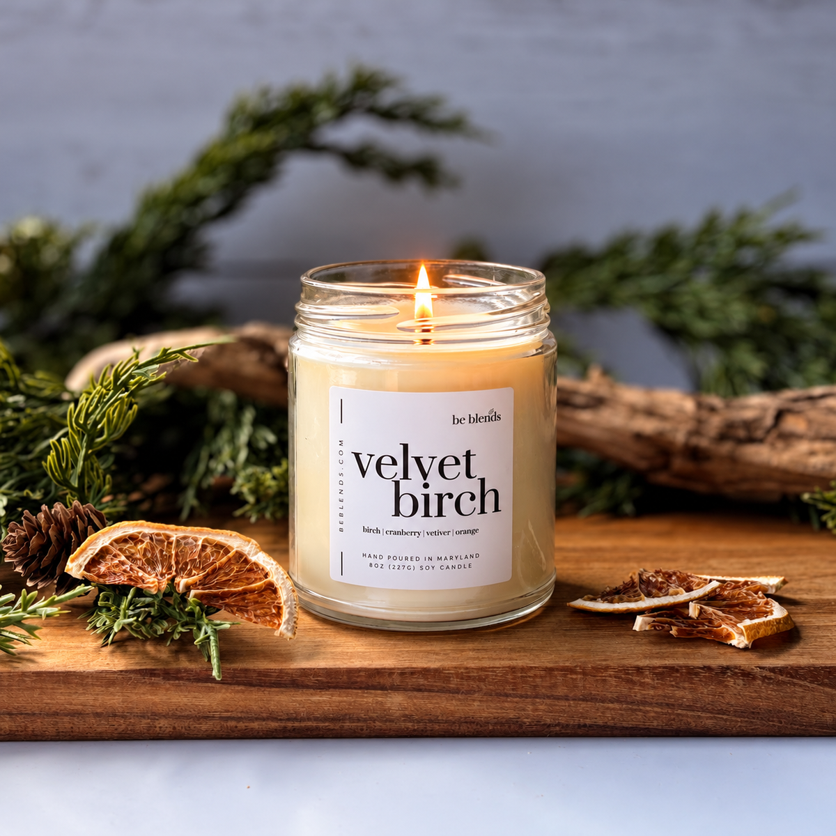 Velvet Birch soy candle by Be Blends with elegant mistletoe, cranberry, cypress, and orange fragrance notes.